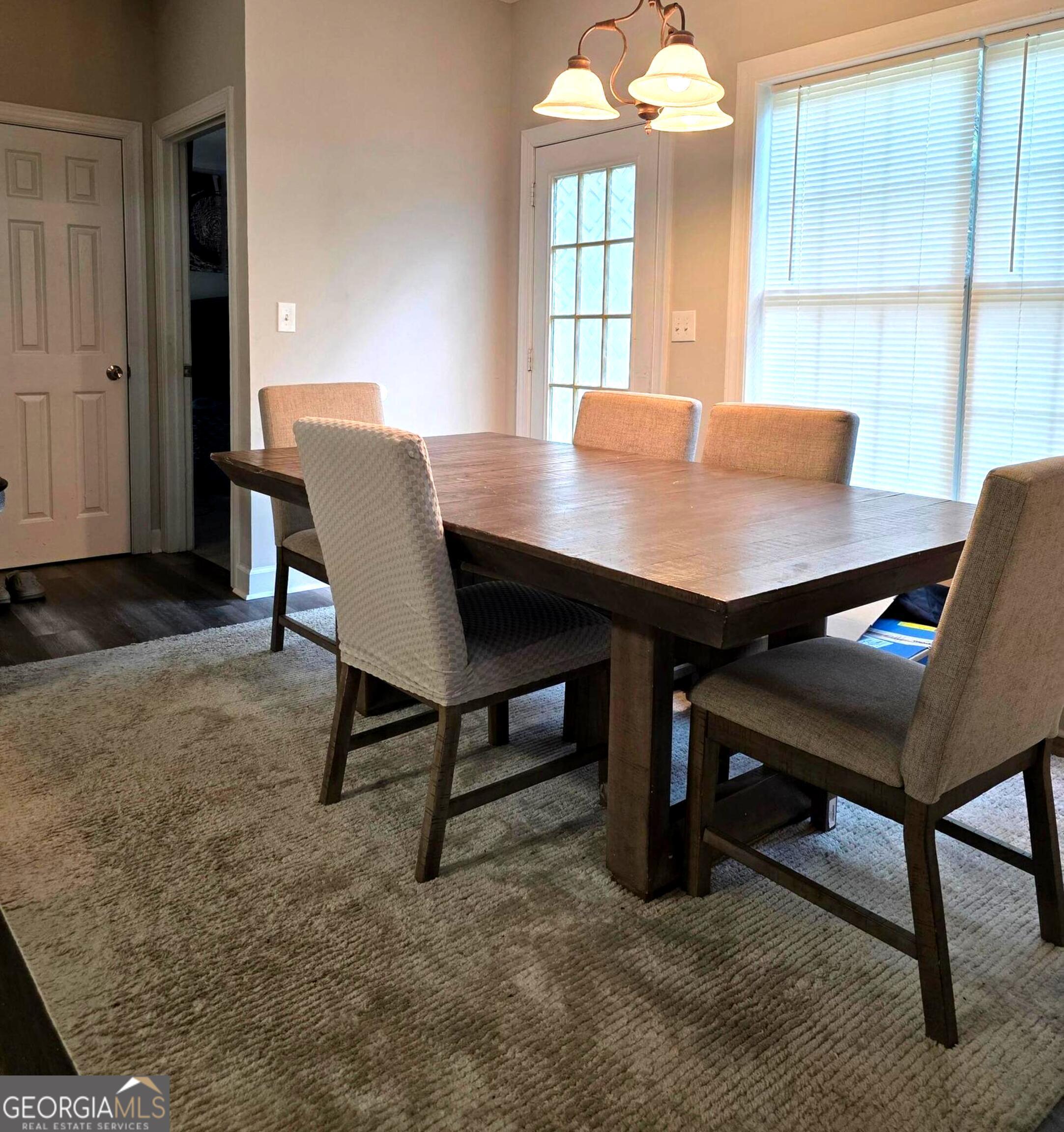 3117 Fairmond Court Villa Rica, GA 30180 - Photo 5 of 20 a view of a dining room with furniture and window