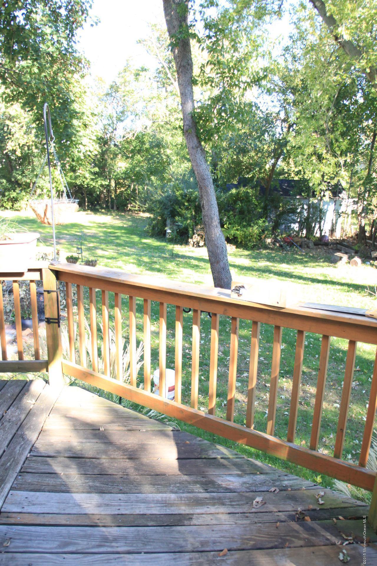 121 Branchport Avenue, Unit A Long Branch, NJ 07740 - Photo 13 of 21 a view of porch with a yard