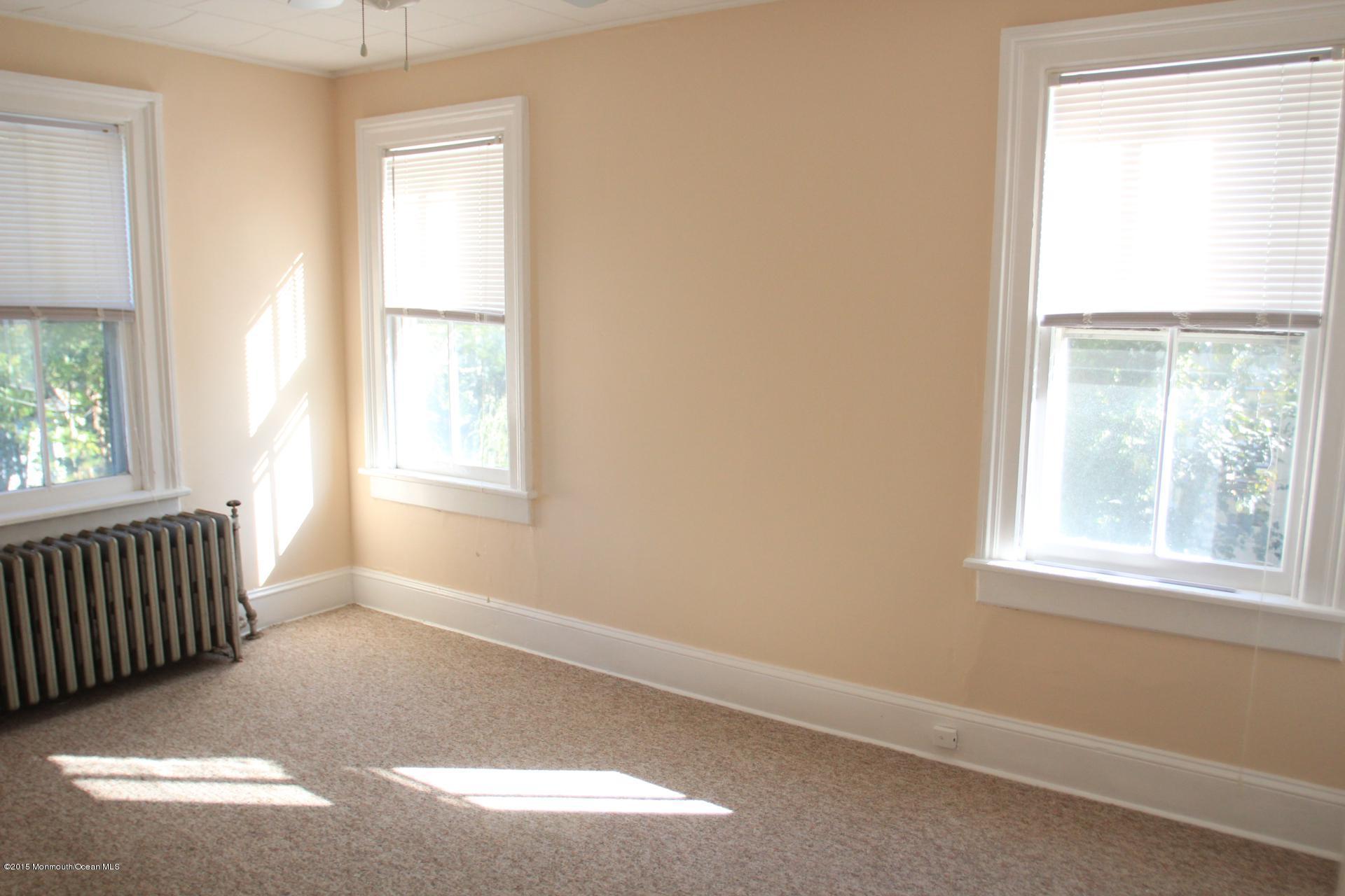 121 Branchport Avenue, Unit A Long Branch, NJ 07740 - Photo 20 of 21 an empty room with a window