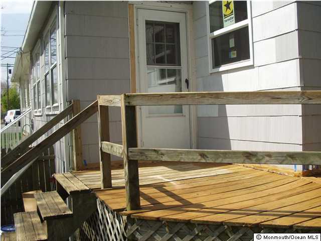 121 Branchport Avenue, Unit A Long Branch, NJ 07740 - Photo 3 of 21 a view of balcony and deck