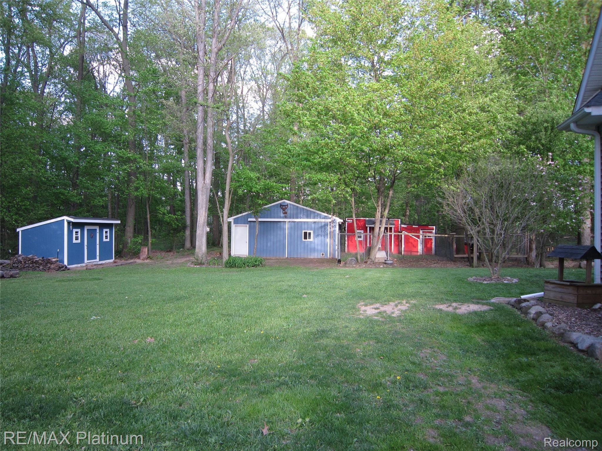 5834 Mack Road Howell, MI 48855 - Photo 10 of 53 Shed, pole barn, chicken coop, goat/dog house and pen