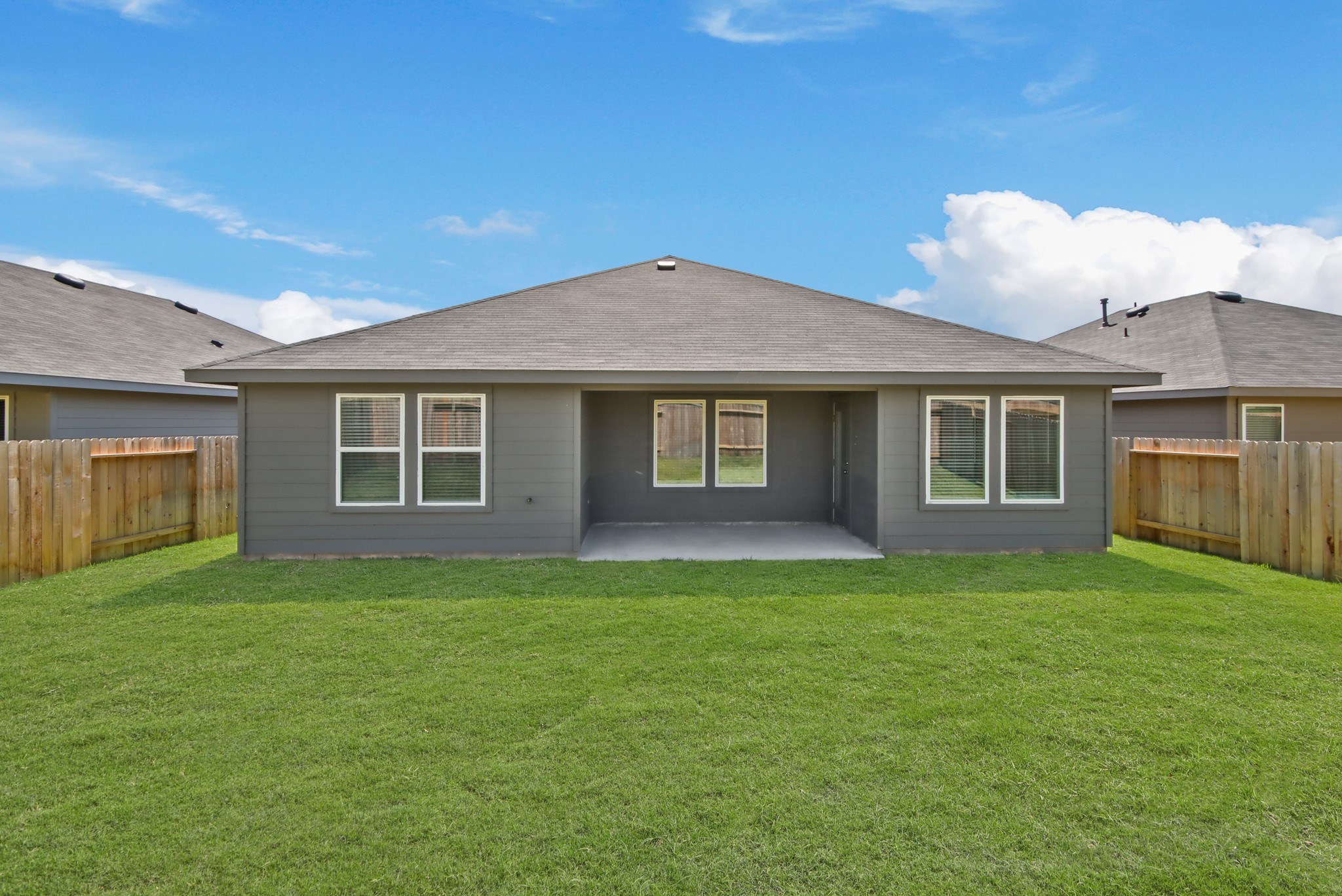 14368 Oceanblue Way Splendora, TX 77372 - Photo 13 of 22 a house view with a garden space