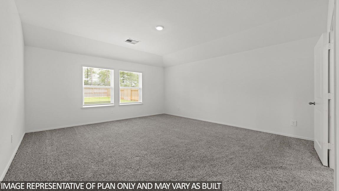 14368 Oceanblue Way Splendora, TX 77372 - Photo 8 of 22 an empty room with windows