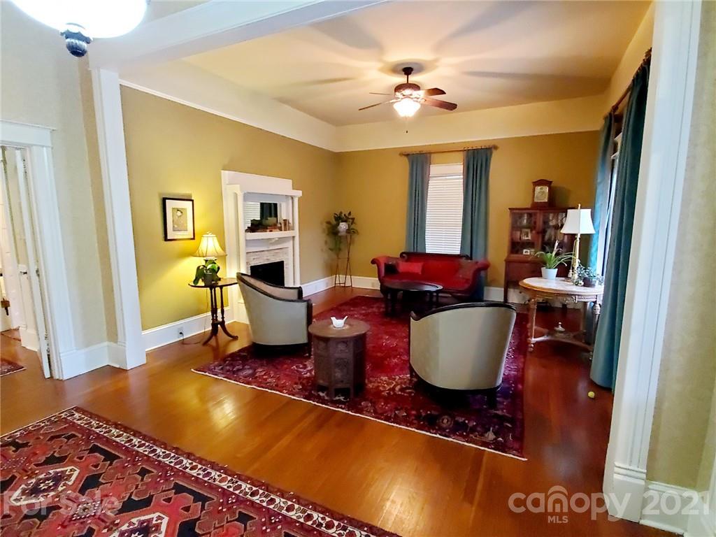 314 Mitchell Avenue Salisbury, NC 28144 - Photo 2 of 19 a living room with hard wood flooring and a couch