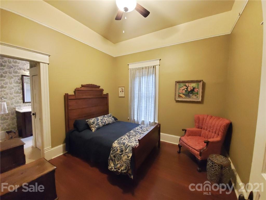 314 Mitchell Avenue Salisbury, NC 28144 - Photo 11 of 19 a living room with furniture and a flat screen tv