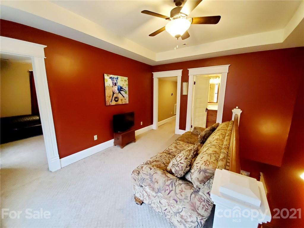 314 Mitchell Avenue Salisbury, NC 28144 - Photo 13 of 19 a living room with furniture and a flat screen tv