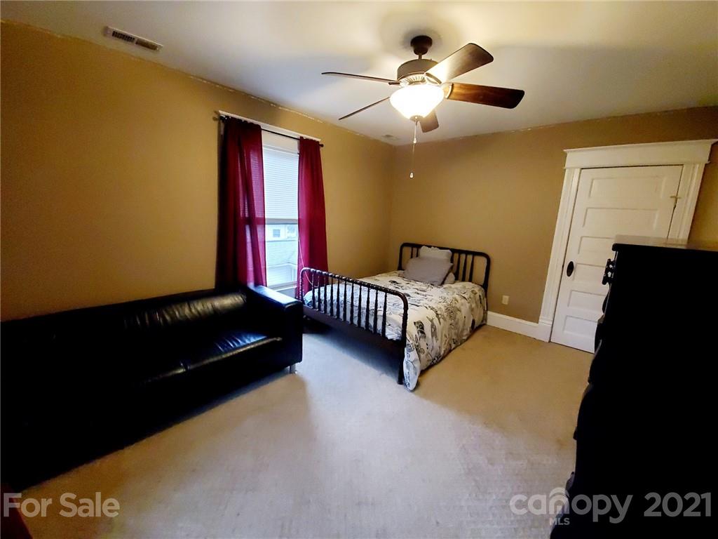 314 Mitchell Avenue Salisbury, NC 28144 - Photo 15 of 19 a bedroom with bed and balcony