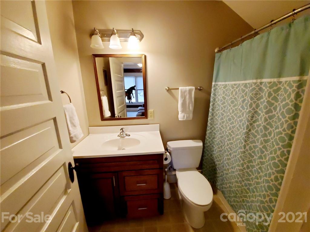 314 Mitchell Avenue Salisbury, NC 28144 - Photo 16 of 19 a bathroom with a toilet sink and mirror
