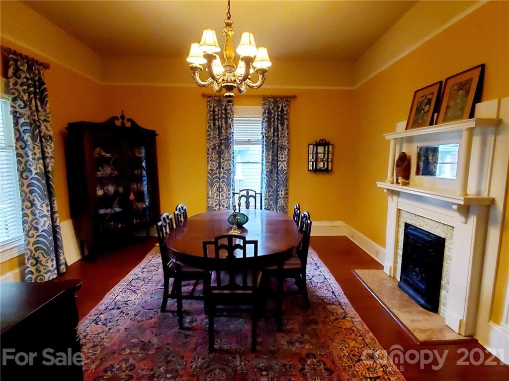 314 Mitchell Avenue Salisbury, NC 28144 - Photo 3 of 19 a view of a dining room with furniture and chandelier