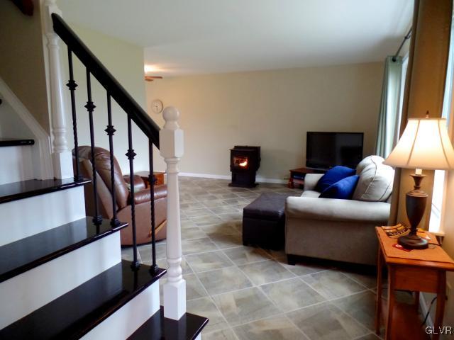 435 Nolf Road Nazareth, PA 18064 - Photo 3 of 14 a living room with furniture and a fireplace