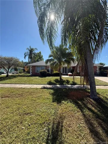 a view of a swimming pool with a garden