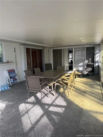 a workspace with furniture and window