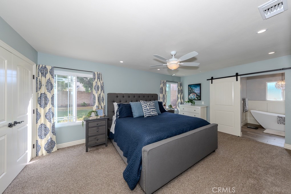 19542 Drybrook Lane Huntington Beach, CA 92646 - Photo 25 of 55 Downstairs Primary Suite with His & Her Closets.