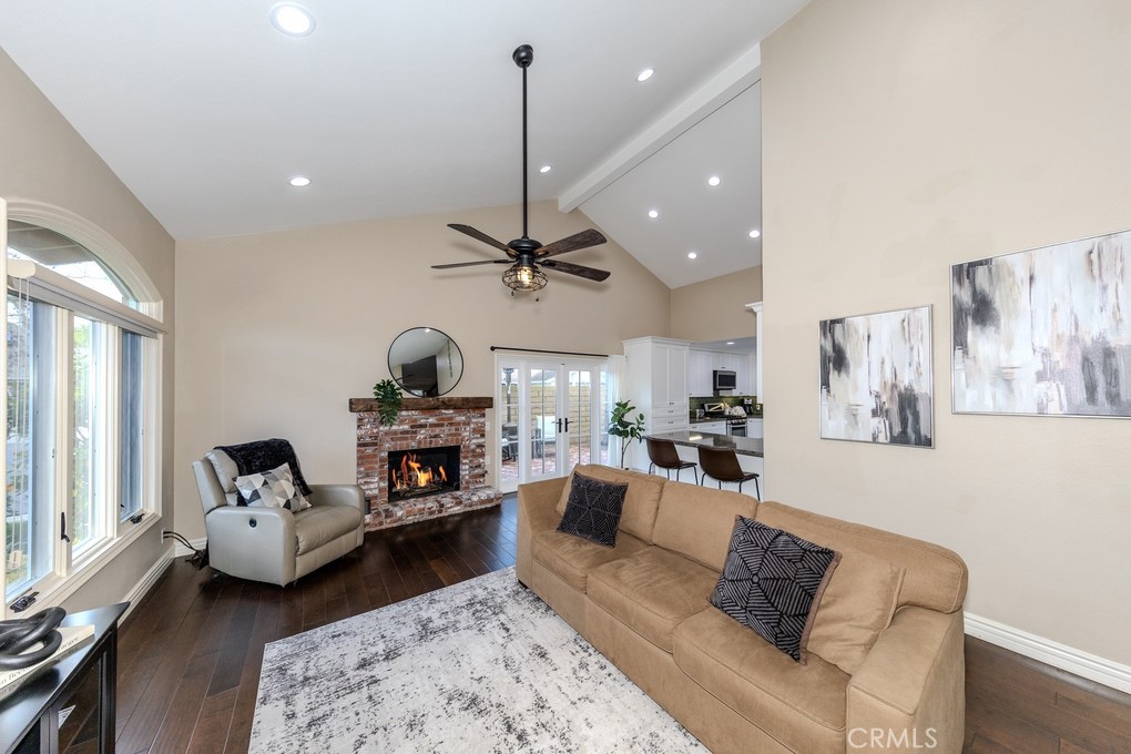 19542 Drybrook Lane Huntington Beach, CA 92646 - Photo 4 of 55 Living Room with Cozy Fireplace