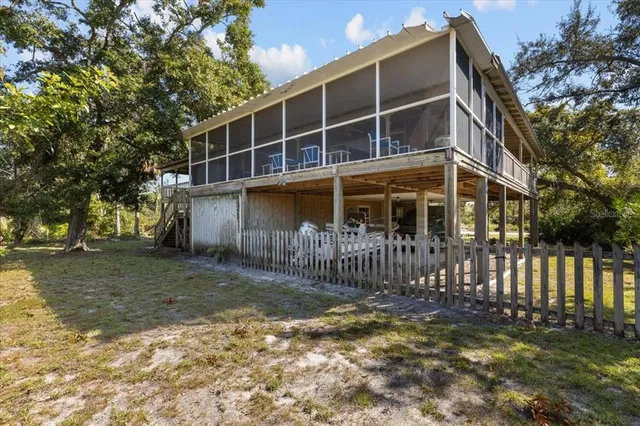 a living room with furniture fireplace and flat screen tv