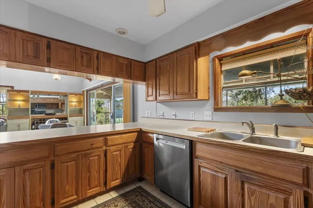 a living room with furniture and pool table