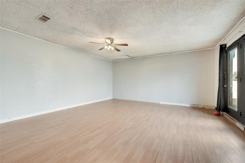 711 Valley Hill Road Duncanville, TX 75137 - Photo 13 of 20 a view of an empty room with a window