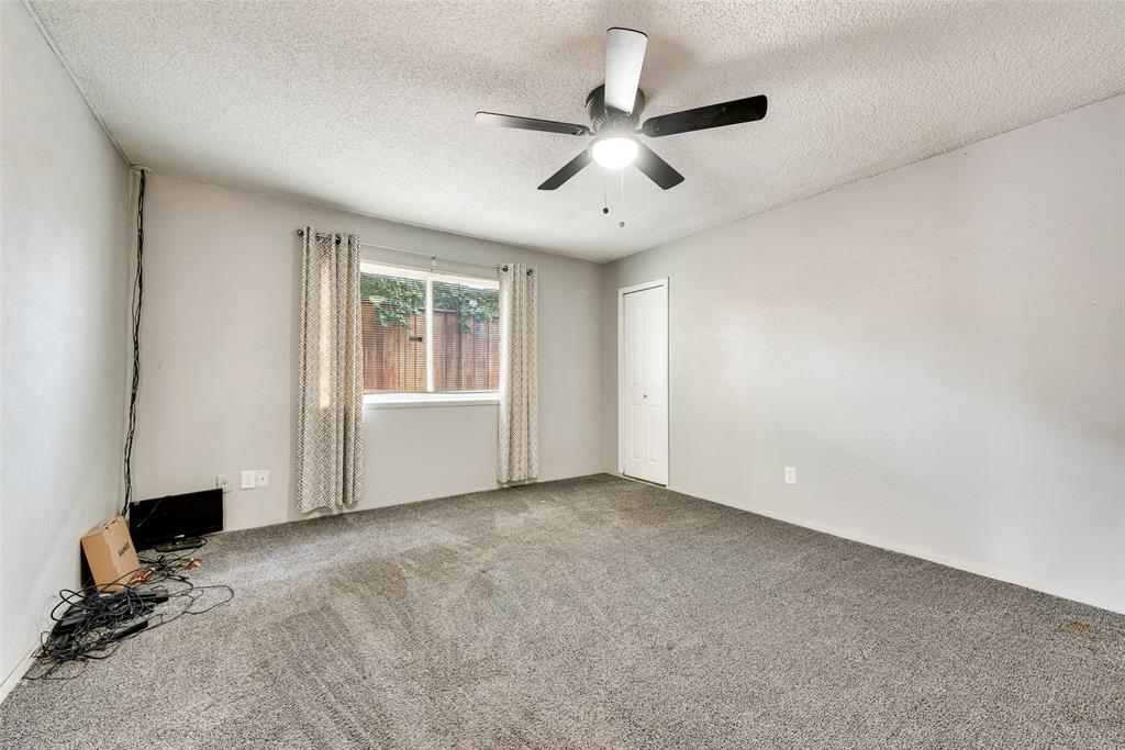711 Valley Hill Road Duncanville, TX 75137 - Photo 15 of 20 a view of an empty room with a window