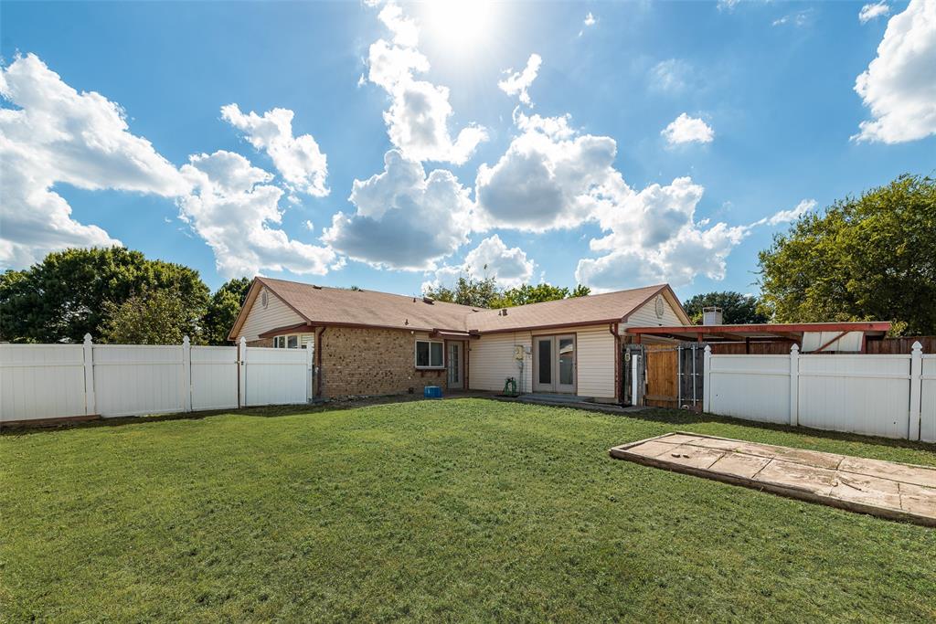 711 Valley Hill Road Duncanville, TX 75137 - Photo 20 of 20 a view of a house with a yard