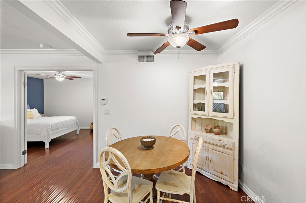 25611 Quail Run, Unit 131 Dana Point, CA 92629 - Photo 7 of 25 a bedroom with a bed and a bookshelf