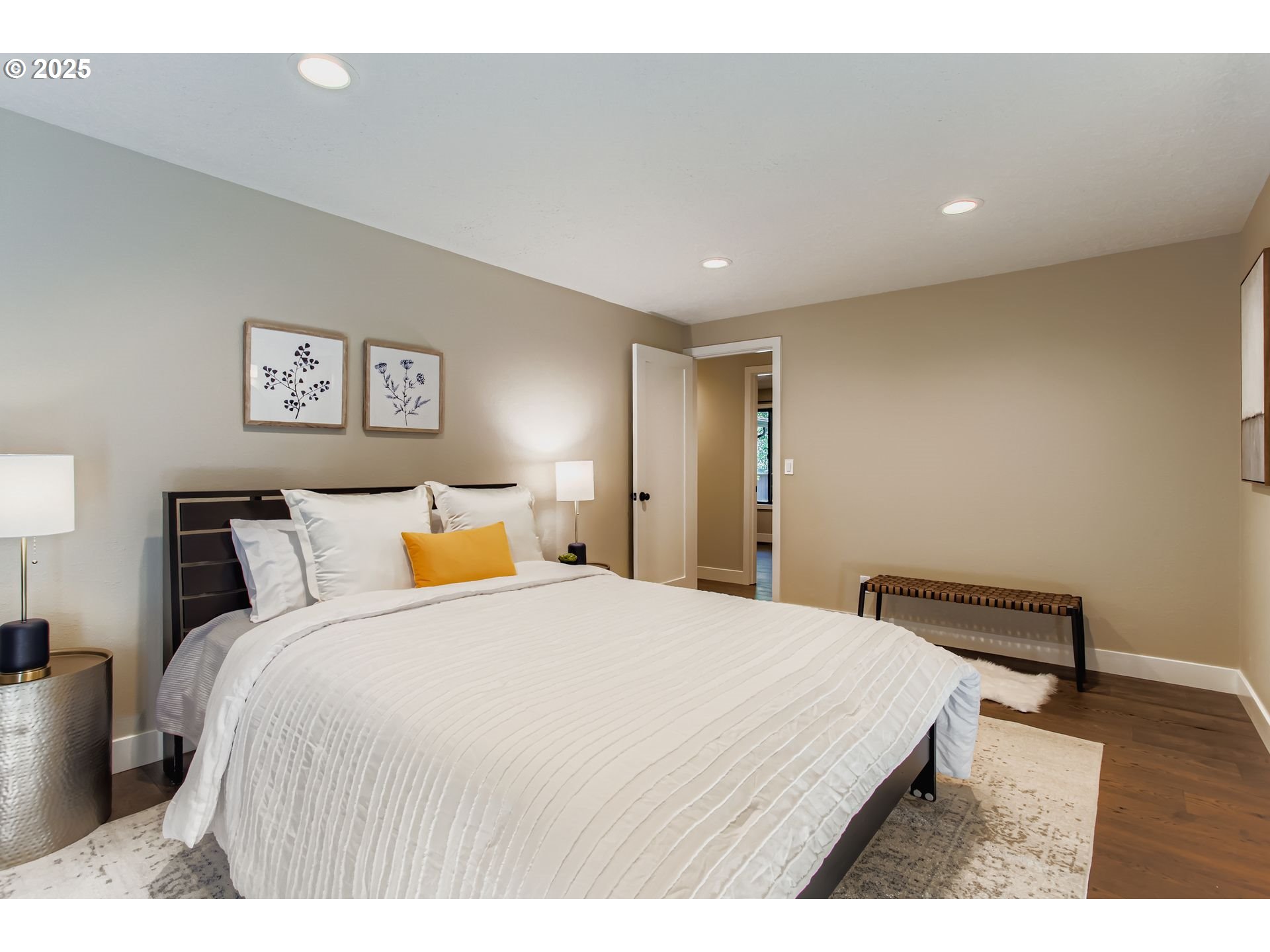 8409 Southwest Jamieson Road Portland, OR 97225 - Photo 17 of 28 a bed room with a bed and a night stand