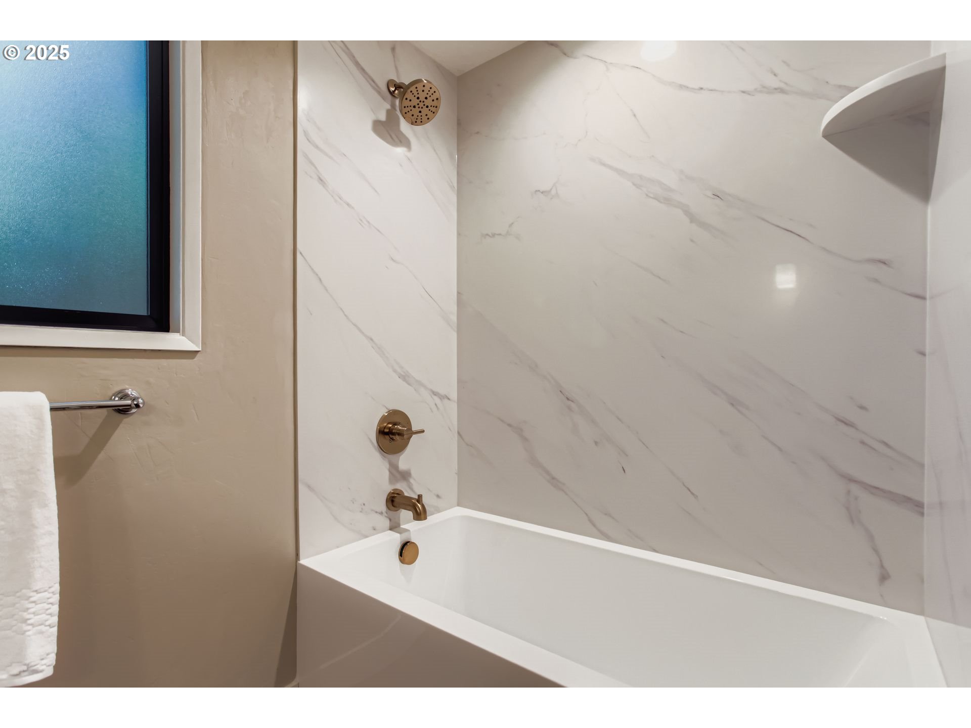 8409 Southwest Jamieson Road Portland, OR 97225 - Photo 23 of 28 a bathroom with a bathtub and a shower