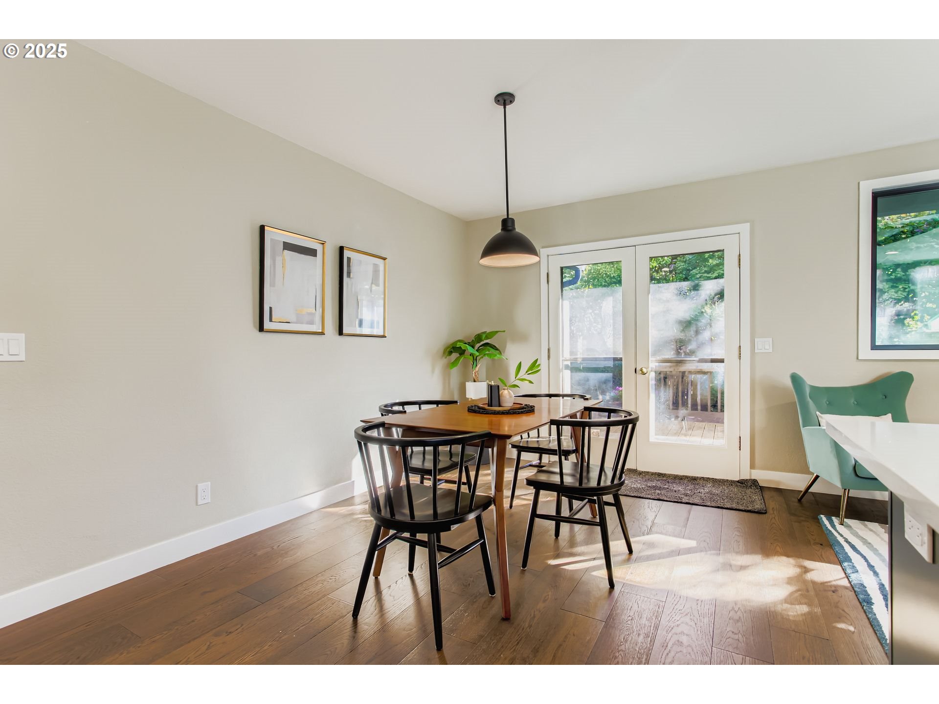 8409 Southwest Jamieson Road Portland, OR 97225 - Photo 9 of 28 a view of a dining room with furniture window and wooden floor