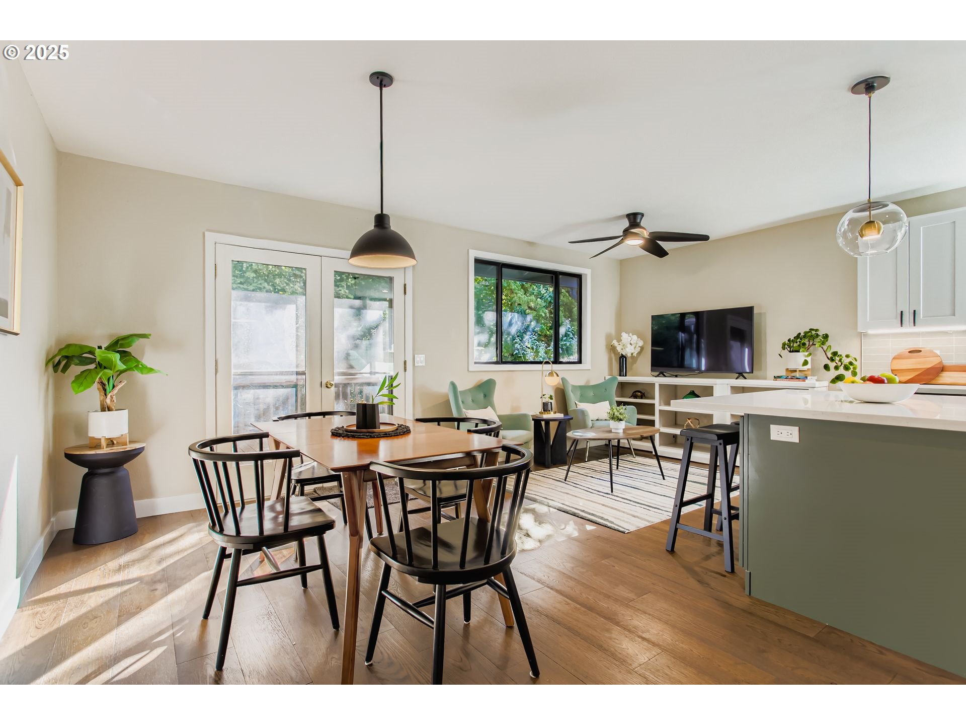 8409 Southwest Jamieson Road Portland, OR 97225 - Photo 10 of 28 a dining room with furniture window and wooden floor