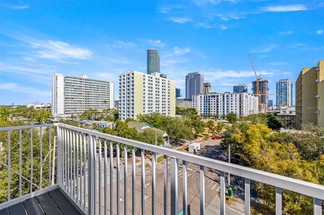 a view of a balcony with city view