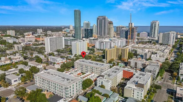 a view of city with tall buildings