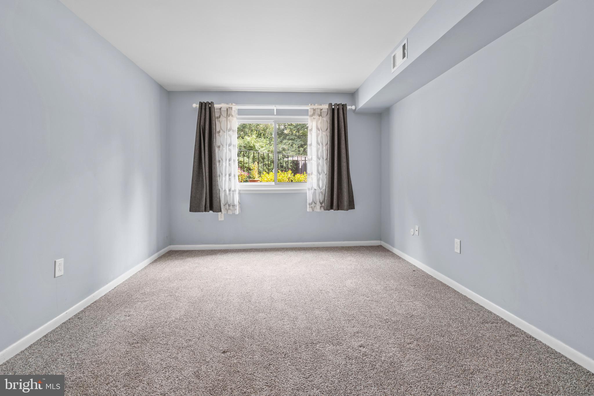 1511 Painters Crossing, Unit 1511 Chadds Ford, PA 19317 - Photo 12 of 17 an empty room with window
