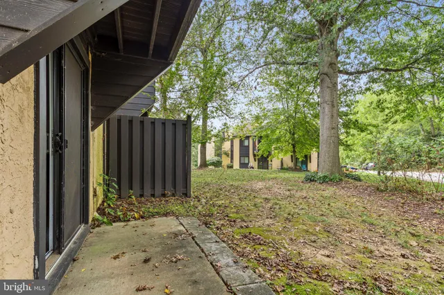 a view of a house with a tree