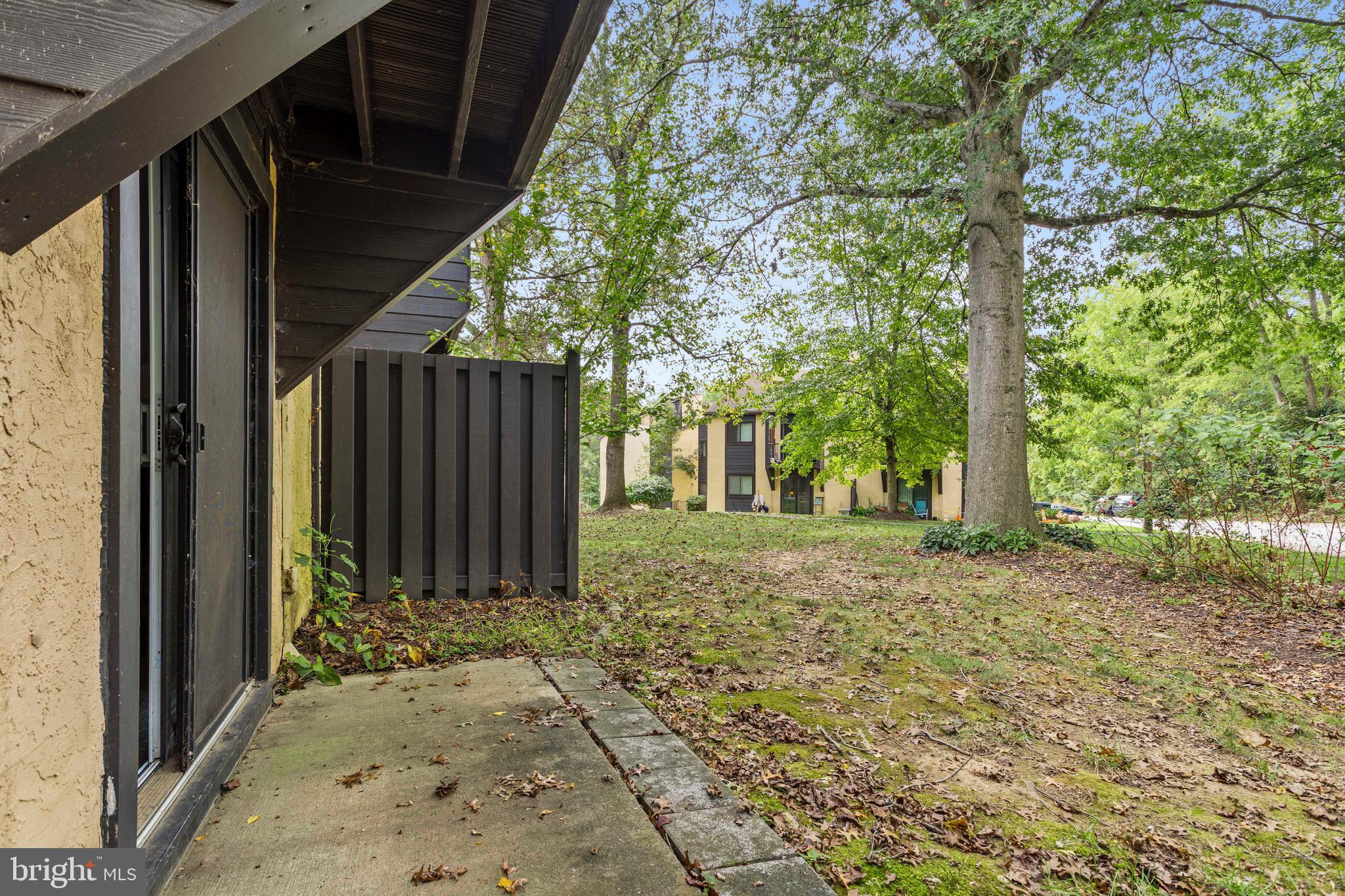 1511 Painters Crossing, Unit 1511 Chadds Ford, PA 19317 - Photo 16 of 17 a view of a house with a tree