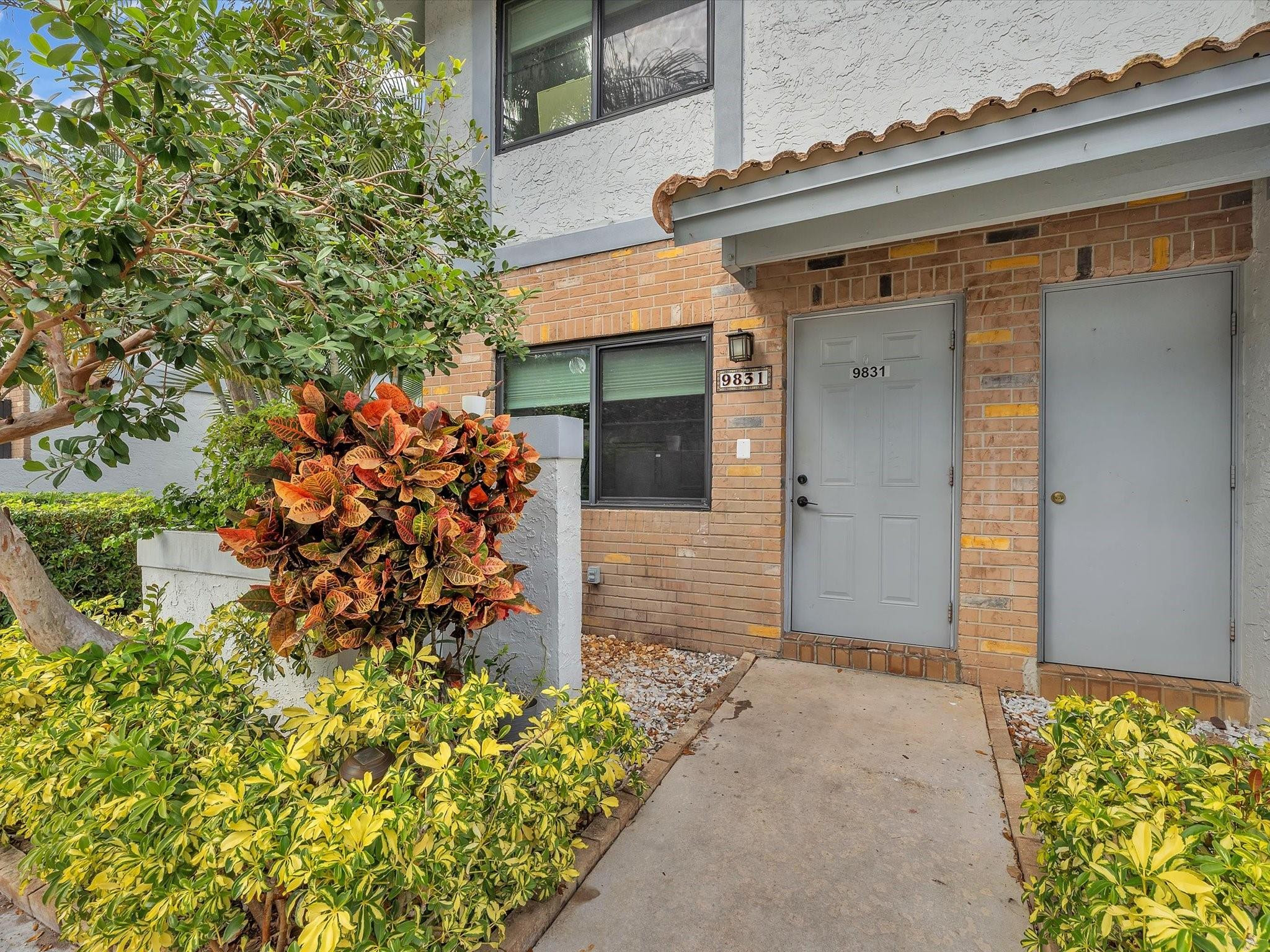 9831 Riverside Drive Coral Springs, FL 33071 - Photo 2 of 27 front view of a house