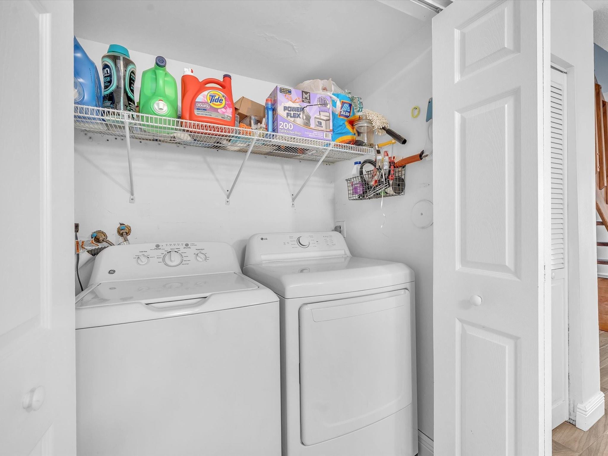 9831 Riverside Drive Coral Springs, FL 33071 - Photo 26 of 27 a utility room with dryer and washer