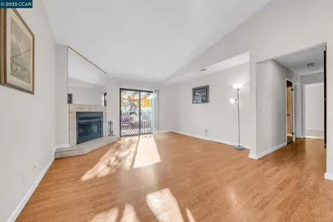 a living room with a fireplace