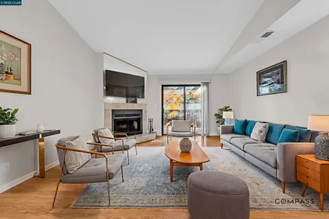 a bedroom with a large bed and a flat screen tv
