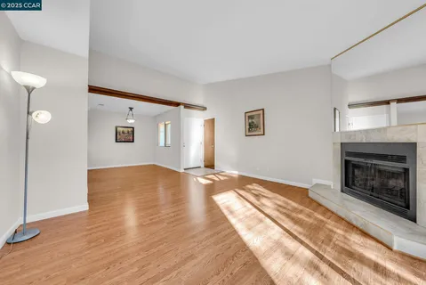 a kitchen with stainless steel appliances granite countertop a sink and a stove