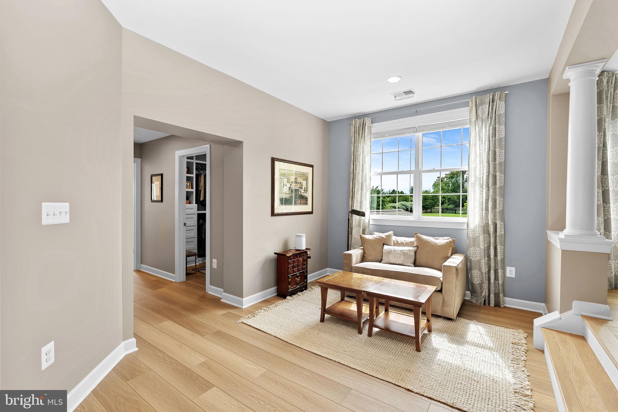 22415 Conservancy Drive Ashburn, VA 20148 - Photo 29 of 70 Sitting area leads to Closets and Ensuite Bath