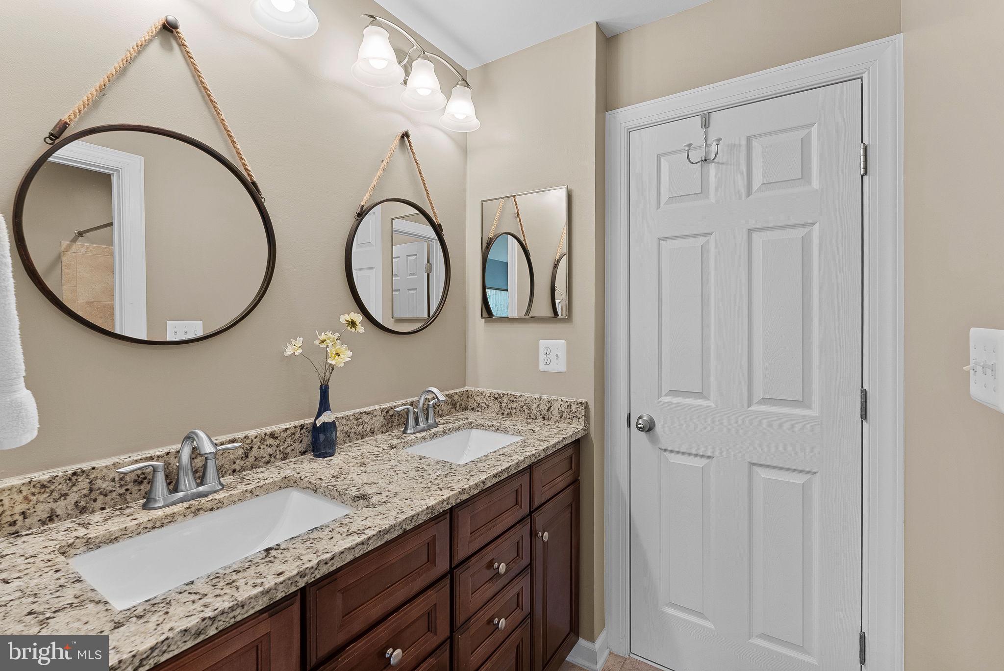 22415 Conservancy Drive Ashburn, VA 20148 - Photo 42 of 70 Jack-n-Jill Bathroom