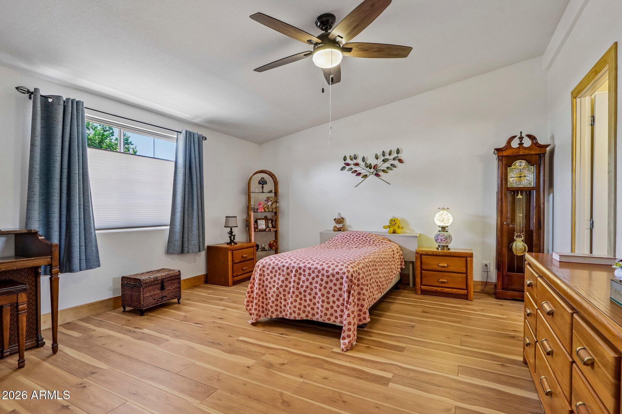 114 South Pinecrest Road Payson, AZ 85541 - Photo 16 of 40 a bedroom with a bed dresser and a window