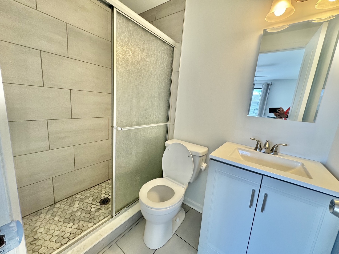 102 North Salem Drive, Unit 102 Schaumburg, IL 60193 - Photo 13 of 19 a bathroom with a toilet and a sink