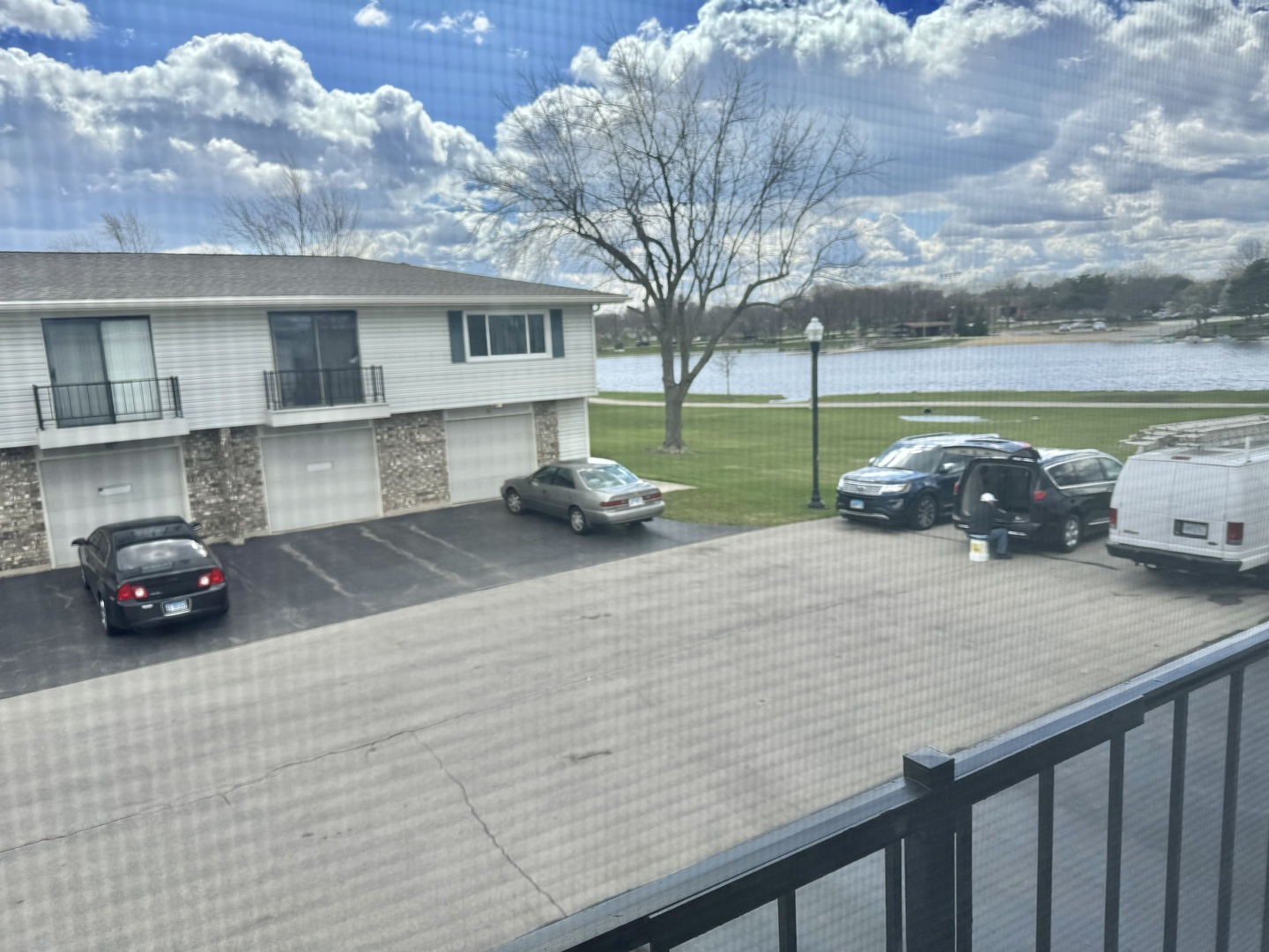 102 North Salem Drive, Unit 102 Schaumburg, IL 60193 - Photo 15 of 19 a car parked on the side of the road