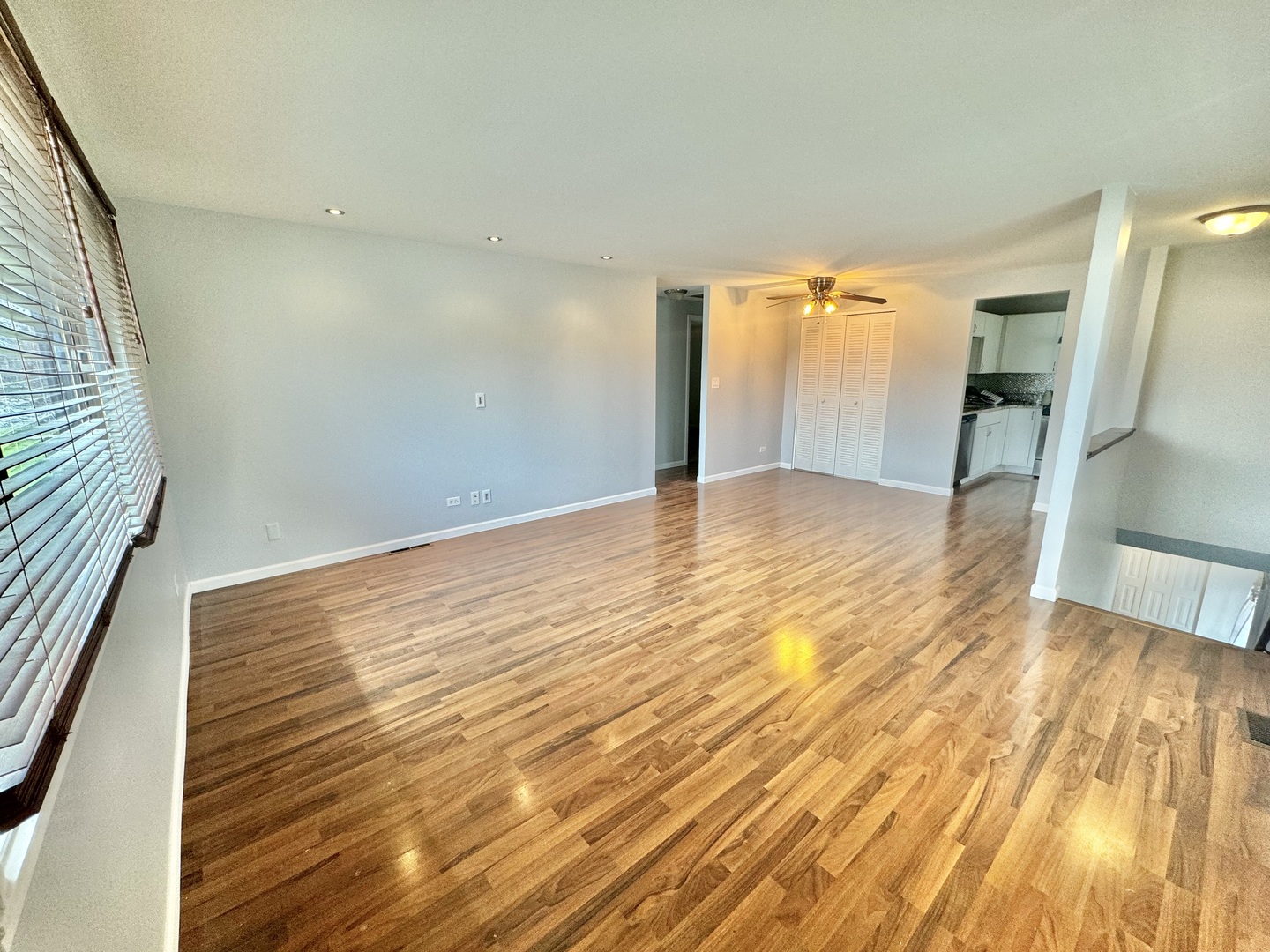 102 North Salem Drive, Unit 102 Schaumburg, IL 60193 - Photo 8 of 19 a view of empty room with wooden floor