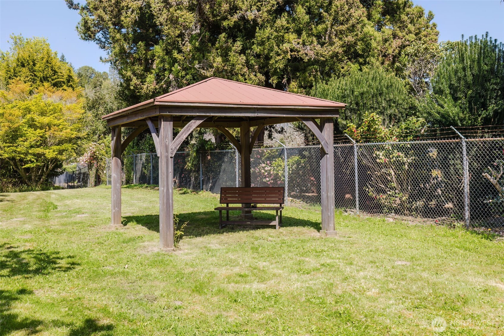 105 Schoolhouse Road Brinnon, WA 98320 - Photo 37 of 39 a view of backyard with small cabin