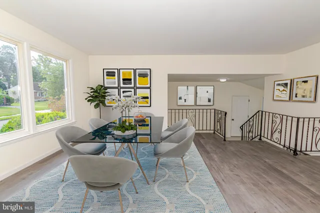 a kitchen with granite countertop a sink and a stove top oven