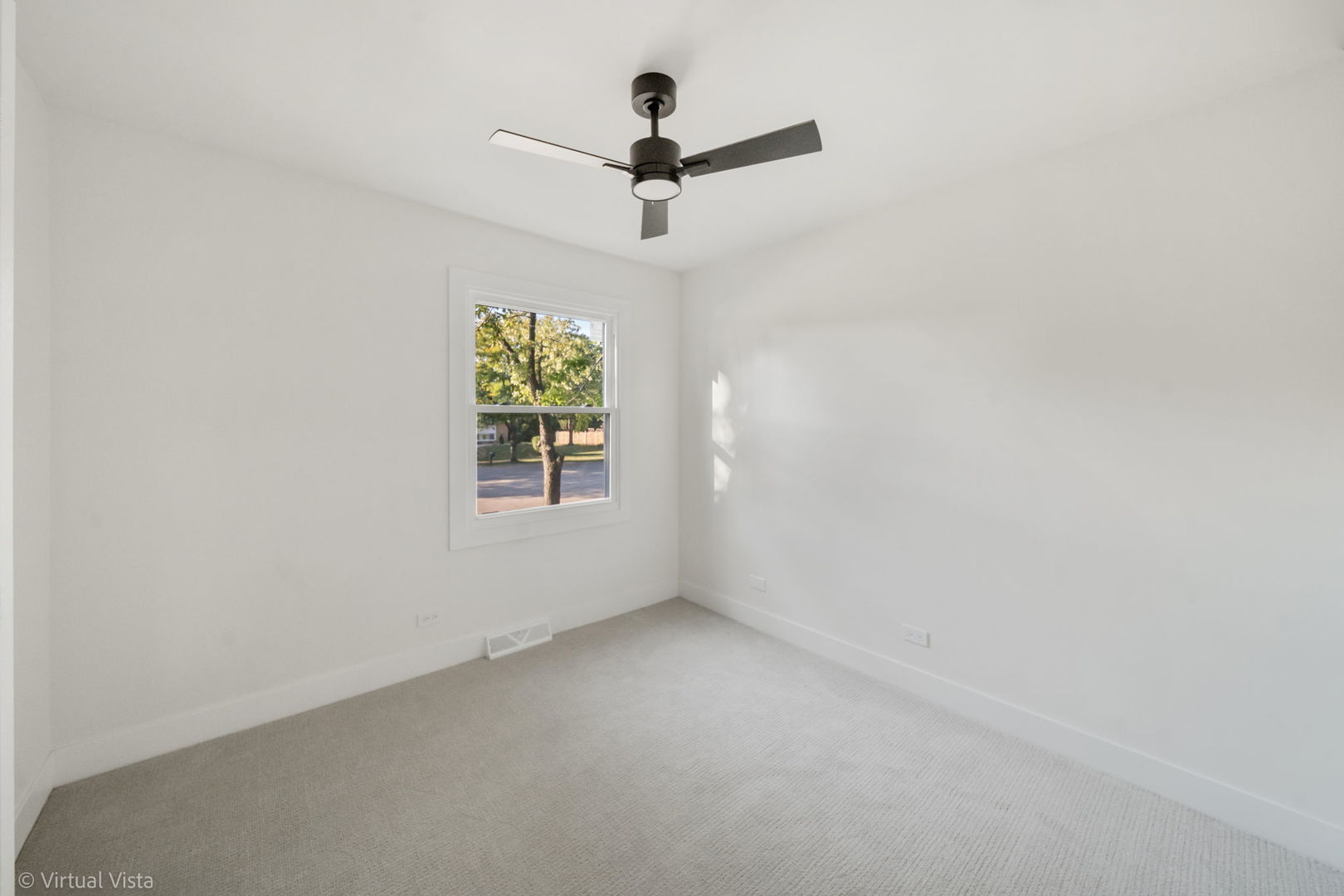 451 Alcester Court Bolingbrook, IL 60440 - Photo 17 of 22 an empty room with ceiling fan and window