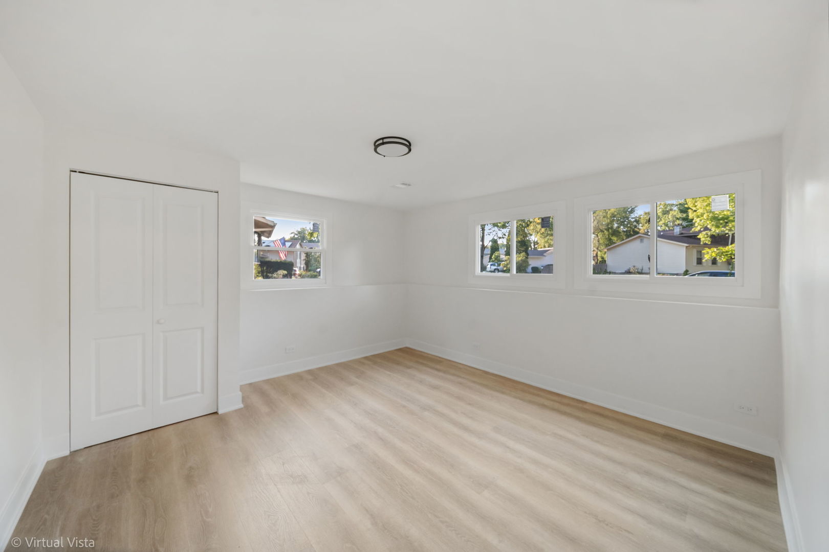 451 Alcester Court Bolingbrook, IL 60440 - Photo 19 of 22 an empty room with windows