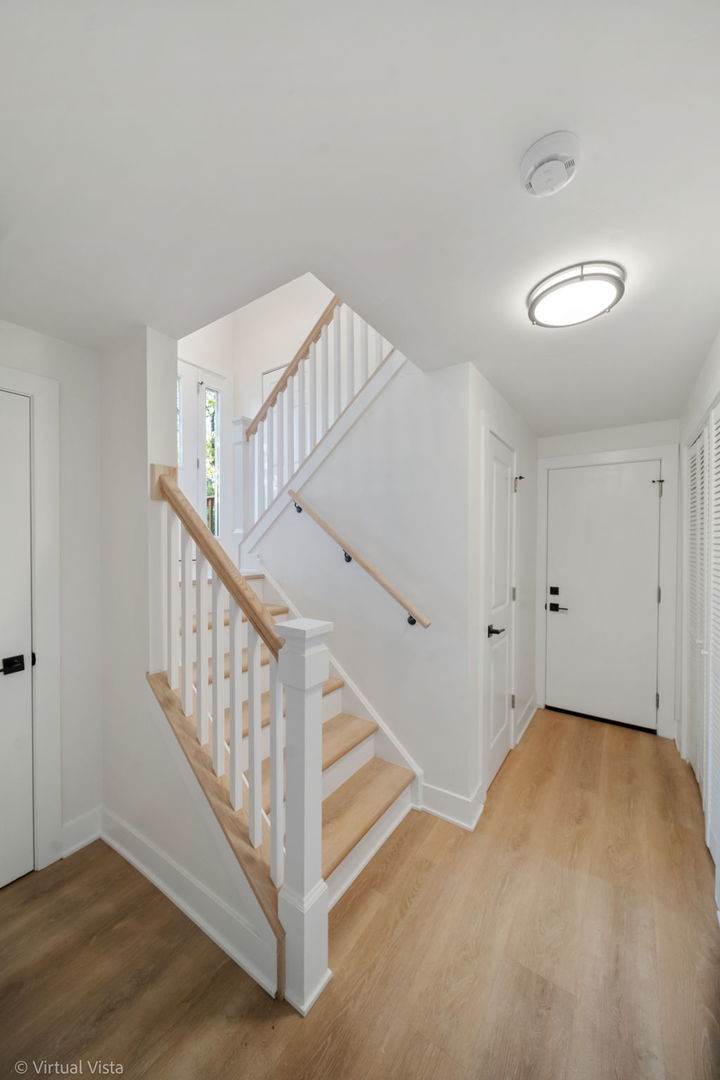 451 Alcester Court Bolingbrook, IL 60440 - Photo 21 of 22 a view of an entryway with staircase