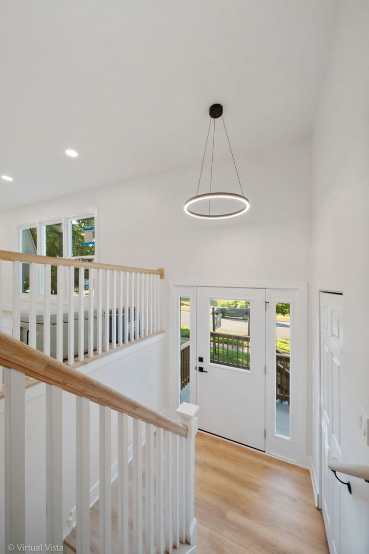451 Alcester Court Bolingbrook, IL 60440 - Photo 4 of 22 a view of a hallway with windows